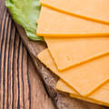aged cheddar cheese slices