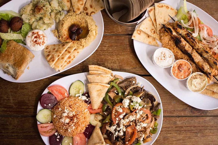 Assortment of traditional Greek dishes on a table